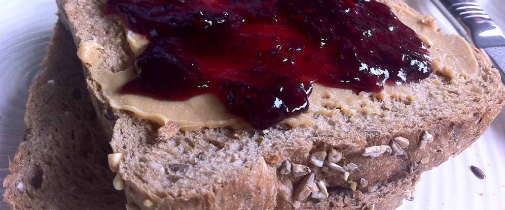 peanut butter and jelly sandwich contrasted with website landing page