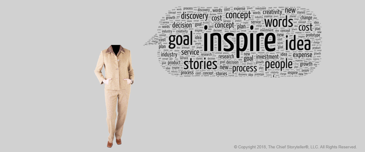 word cloud - message cloud with inspire at the center, black text on gray background, executive with arms in front in pockets, female,