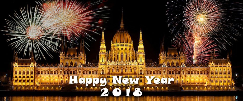 happy new year 2018 with fireworks going off over the Parliament Building in Budapest, Hungary