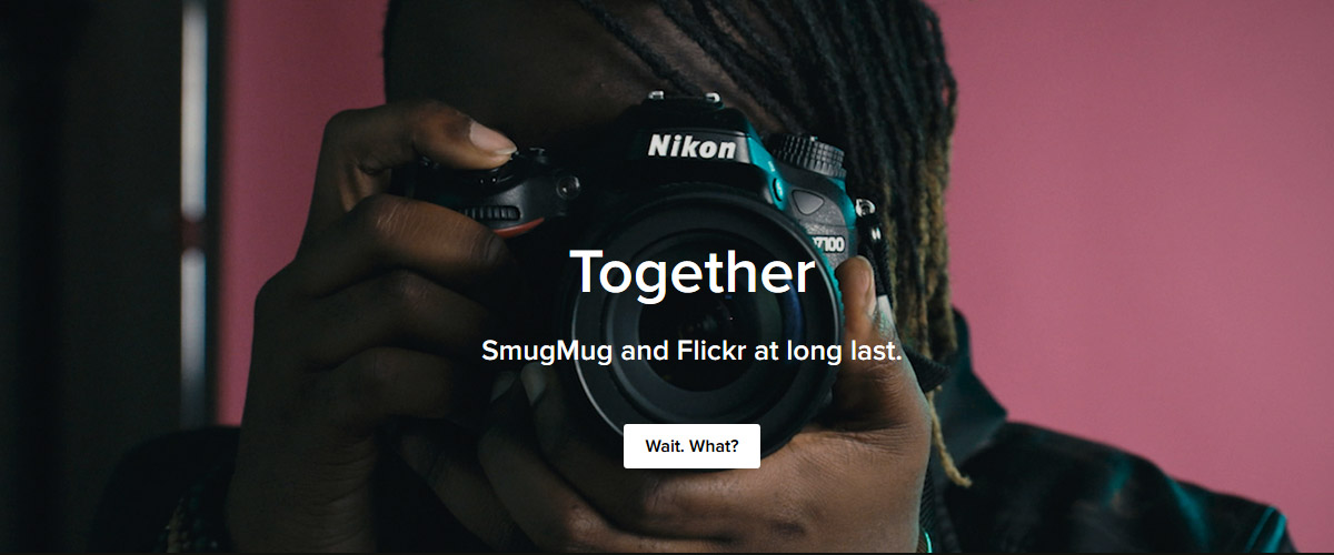 photographer facing his lens directly toward us, big bold text "Together, SmugMug and Flickr at long last"