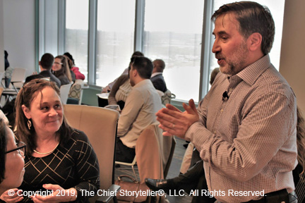 TEDCO Workshop Ira Koretsky helping participant with her elevator pitch Executive Storytelling Workshop