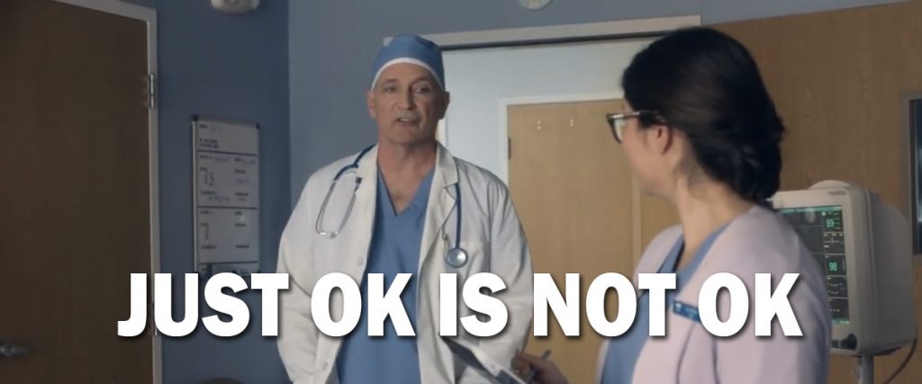 screen grab from AT&T ad, Just Ok is not Ok, surgeon talking to nurse in hospital room