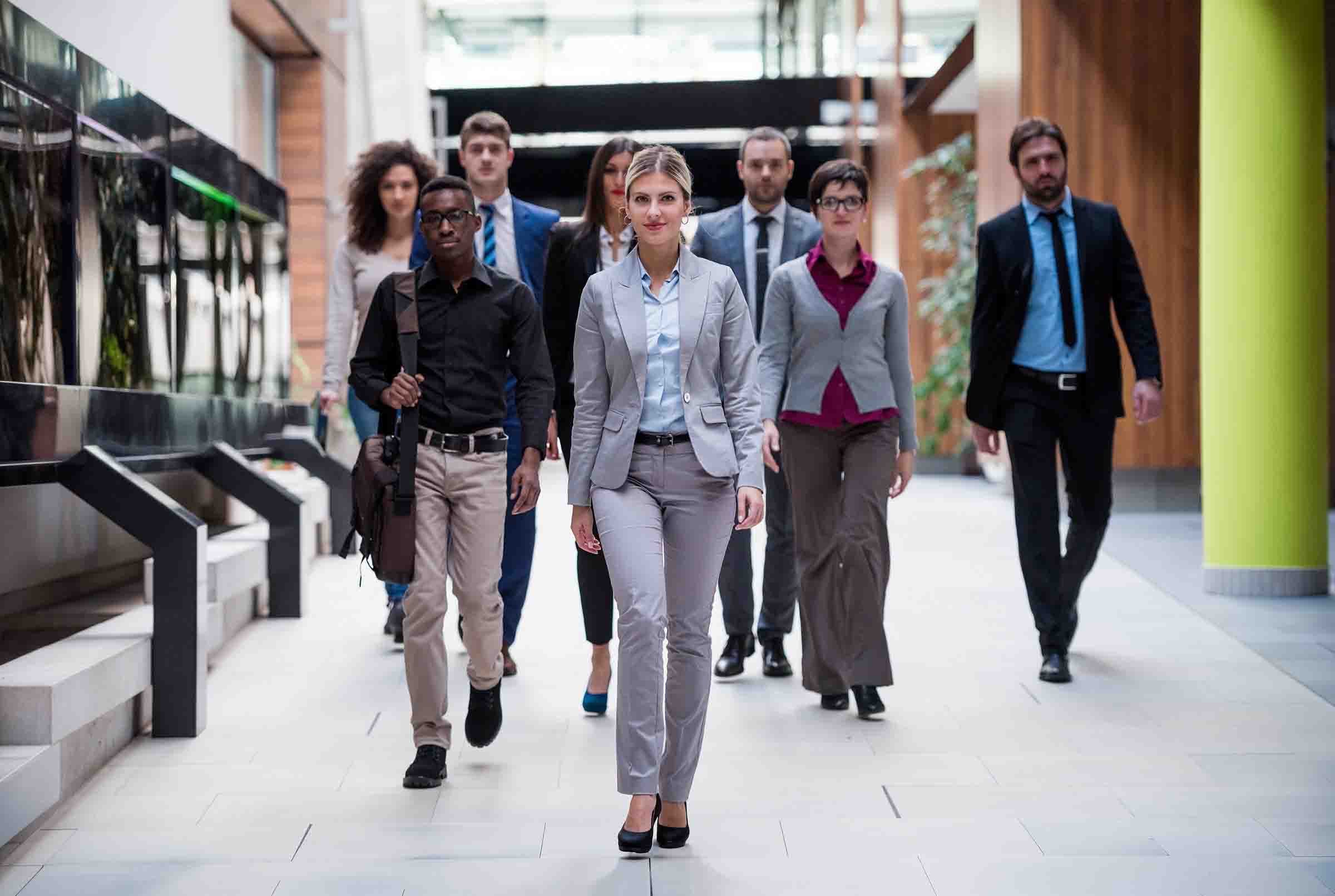 Metaphor of female CEO in a plane that is outlined in the clouds demonstrating financial success at selling company through M&A